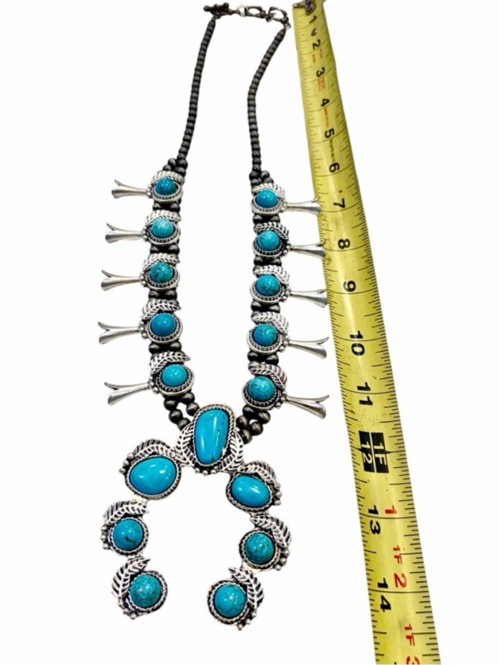 Squash Blossom Navajo Style
Faux Turquoise Silver Tone
Necklace non magnetic - Picture 5 of 12